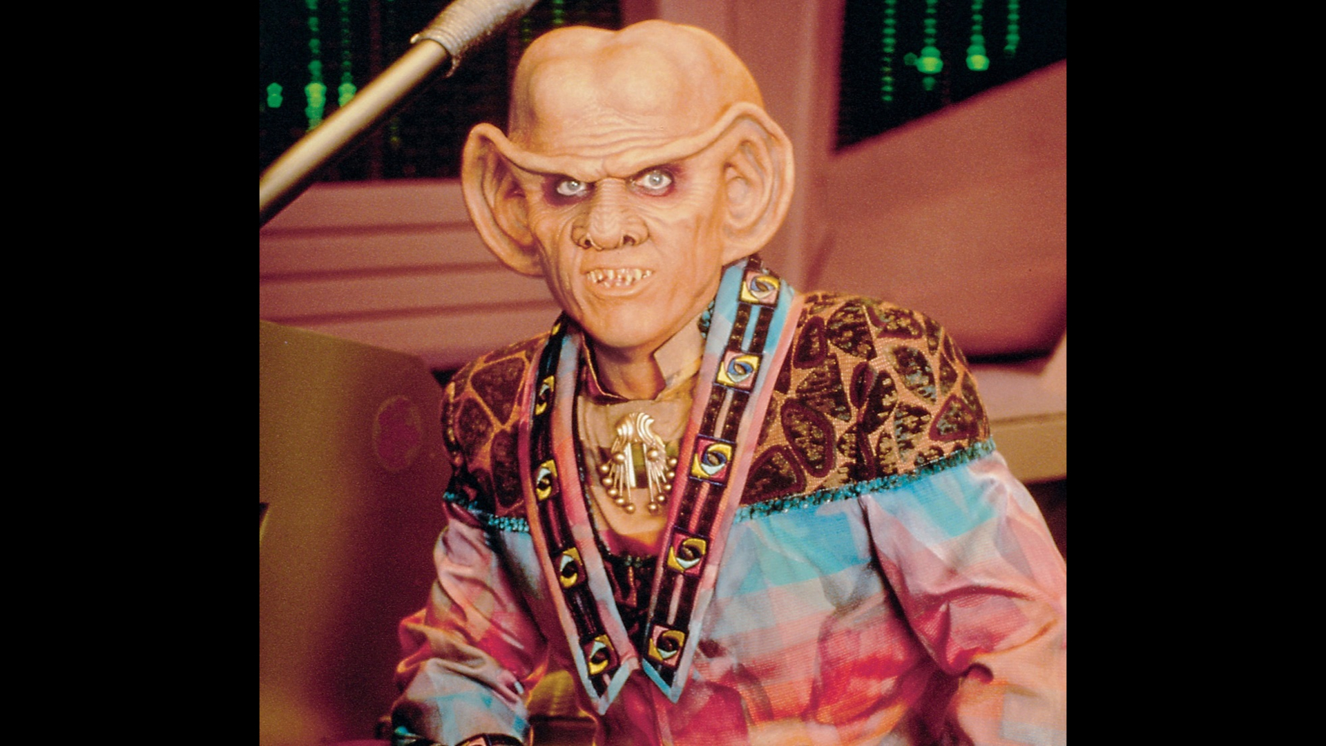 A slide showing the character Quark from the TV show Star Trek.