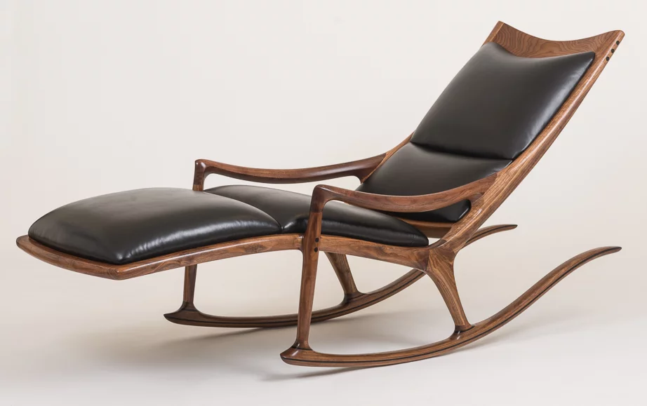 A mid-twentieth-century carved wooden rocking chair by Sam Maloof.